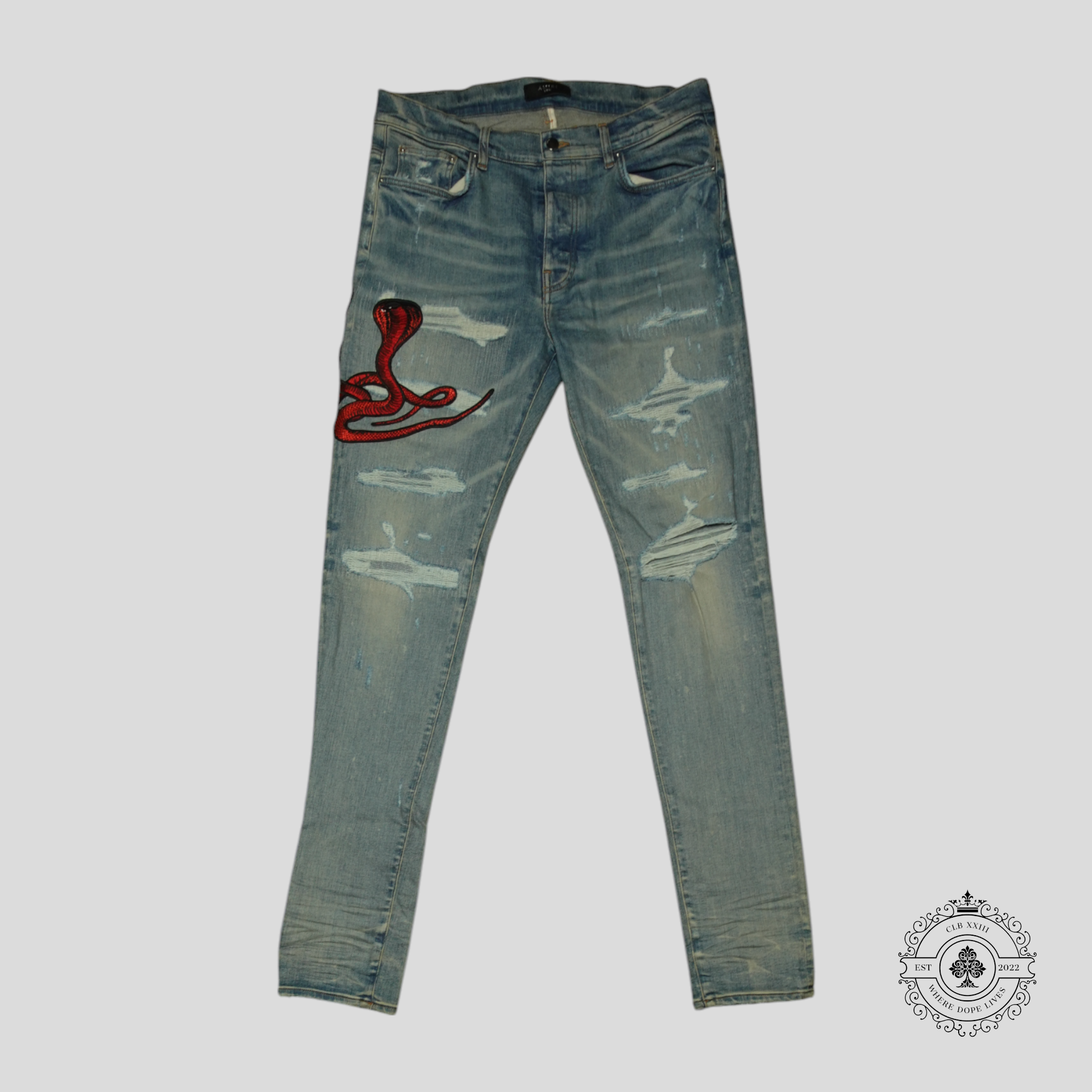 Amiri Red Poison Archival Jeans in Medium Wash